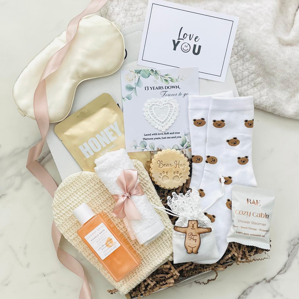 Lace anniversary gift box for her, a thoughtful 13th wedding anniversary gift with pampering treats and romantic keepsakes.