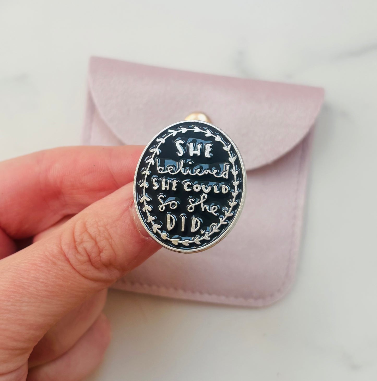 She Believed She Could Pin Badge